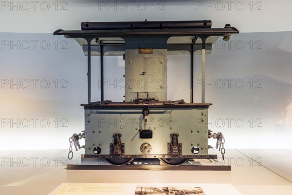 Daimler engine locomotive from 1893. The Mercedes-Benz Museum in Stuttgart presents a journey through the automotive history of the global corporation. The history of the Mercedes star begins with the first automobile in 1886. 160 vehicles are on display. Stuttgart, Baden-WÃ¼rttemberg, Germany