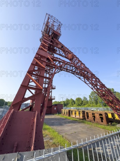 Historic red headframe historic red winding tower of Bonifacius colliery coal mine in today's Kray Nord district, Essen, North Rhine-Westphalia, Germany