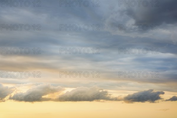 Dramatic cloudy sky shortly in front of sunset