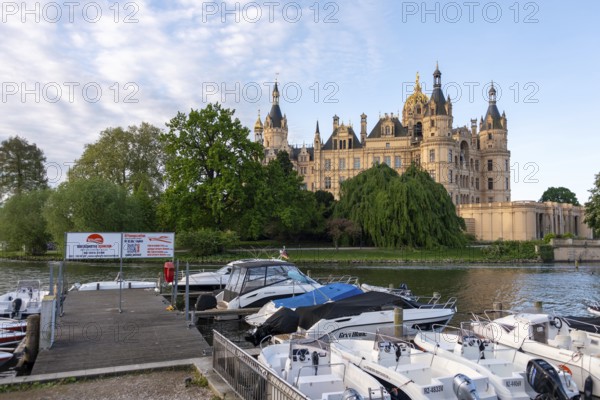 View of Schwerin Castle from the jetty on Lake Schwerin, Schwerin, Mecklenburg-Western Pomerania, Germany