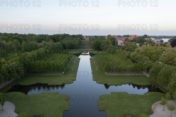 Symmetrically laid out avenues and a central water basin characterise the baroque palace garden in Schwerin, Mecklenburg-Vorpommern, Germany
