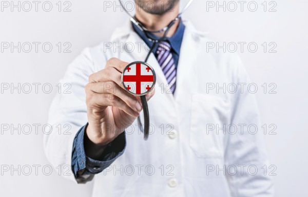 Georgia healthcare system, doctor holding stethoscope. Georgia health and medical insurance concept