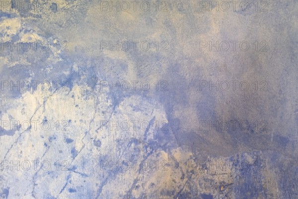 Blue-beige wall with rough texture and worn, abstract appearance, background, texture, MÃ¼nsterland, North Rhine-Westphalia, Germany