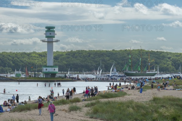 Windjammer Parade 2025 on the Kiel Fjord at the end of Kiel Week, tall ships, three-master Alexander von Humboldt, spectators, Falkensteiner Strandleben, lighthouse, summer weather, sunshine, forest, Kiel, Schleswig-Holstein, Germany