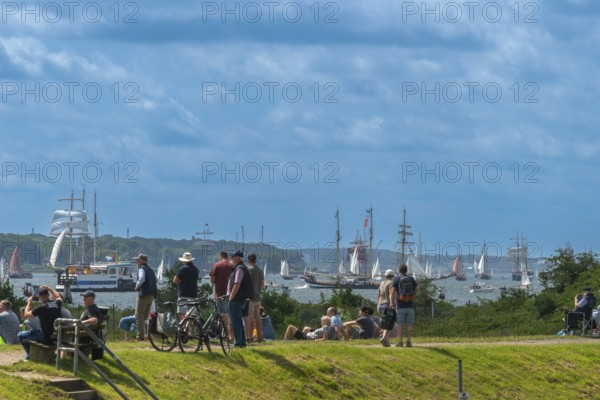 Windjammer Parade 2025 on the Kiel Fjord at the end of Kiel Week, tall ships, three-master, spectators on the dyke, Falkenstein beach, lighthouse, summer weather, sunshine, forest, Kiel, Schleswig-Holstein, Germany
