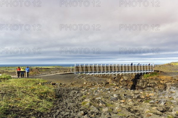 Metal lattice bridge over continental divide, Mid-Atlantic Ridge, volcanic landscape, Reykjanes Peninsula, near Reykjavik, Iceland