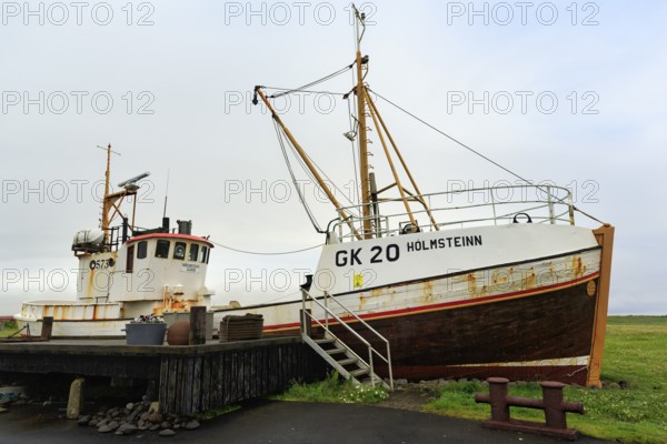 Shipwreck, fishing boat in a meadow, Gardur near KeflavÃ­k, SuÃ°urnes, Sudurnes, Reykjanes Peninsula, Iceland