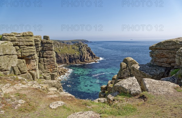Rock formation off the west coast of England on the Atlantic Ocean. Land's End, the tip of the headland in the west of Cornwall, is the most westerly point in England. Land's End, Sennen, Penzance, Cornwall, South West England, Great Britain