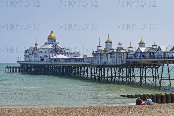 Beach and pier in Eastbourne, seaside resort on the English Channel, in the county of East Sussex, England, United Kingdom of Great Britain