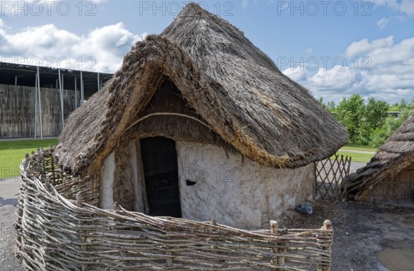 The replicas of Neolithic houses are part of the Neolithic Living and Houses exhibition at the Stonehenge Visitor Centre. Amesbury, Wiltshire, South England, Great Britain