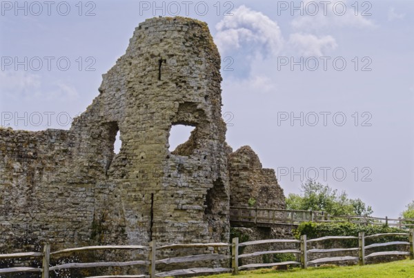 Castle wall of Pevensey Castle, a Norman castle, in the village of Pevensey, Sussex, England, Great Britain