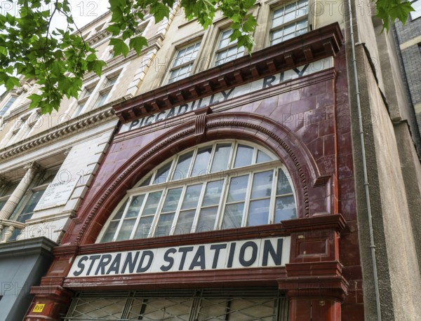 Frontage of closed Strand Station, Piccadilly Railway, Aldwych, central London, England, UK