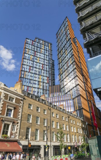 Tower block apartments of One Crown Place rise high above older properties, Sun Street, City of London, England, UK
