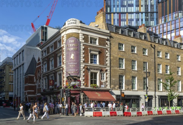 The Flying Horse pub on corner of Sun Street and Wilson Street, City of London, England, UK