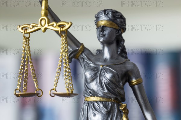 Close-up of a Justitia as a symbol of court judgements, jurisdiction, justice, etc