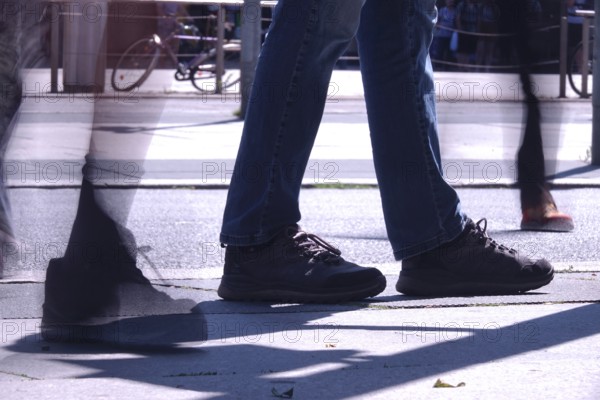 Passers-by in a summer city, shopping, Germany