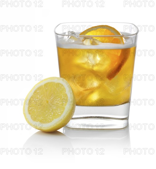 Cocktail in a tumbler on ice with half a slice of orange and half a lemon as garnish against a white background, studio shot