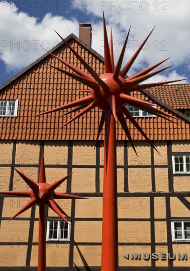 Artwork by Otto Piene entitled Fireworks for Celle in front of a half-timbered house in the historic city centre, Lower Saxony, Germany