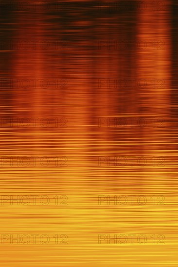 Colours of the sun... Sunset on the water (Lower Rhine, North Rhine-Westphalia), yellow red orange water reflection, reflection of the colours of the setting sun on a calm, only slightly moving water surface, local nature, Bislicher Insel, district Wesel, Rhineland, Lower Rhine, North Rhine-Westphalia, Germany, Western Europe