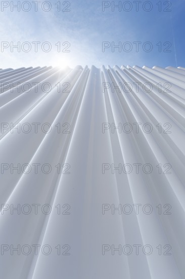 Modern white faÃ§ade made of corrugated acrylic glass, Plexiglas, SANAA production hall, architect Kazuyo Sejima and Ryue Nishizawa, sun rays, Vitra Campus, Vitra Design Museum, Weil am Rhein, Baden-WÃ¼rttemberg, Germany