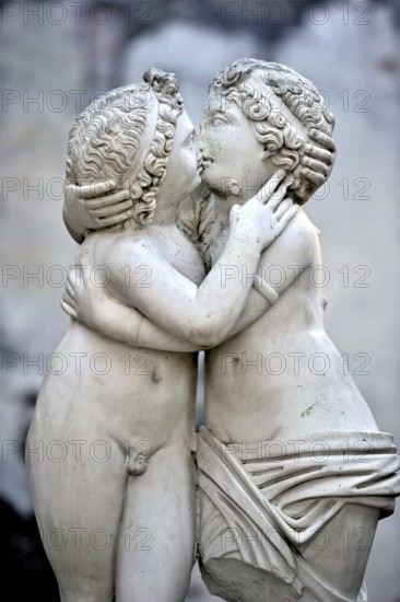 Statue of Love and Psyche, man and woman kissing, naked couple, stone carving in marble, excavation site Archaeological Park Ostia Antica, Metropolitan City of Rome, Lazio, Italy