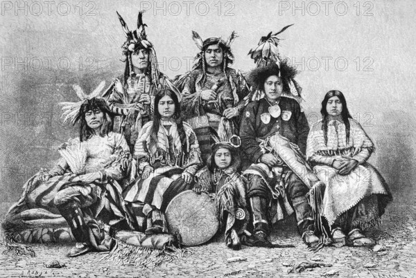 Portrait, group of Indian warriors with their wives, feather jewellery, plaited hairstyle, woven traditional costume, blankets, sad look, North America, historical illustration 1888