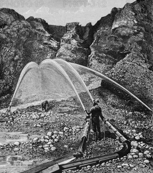 Water machines at the gold diggers in the Rocky Mountains, search, gold rush, precious metal, water spraying, water cannon, river, valley, California, North America