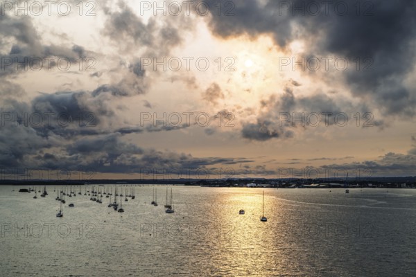 Sunset of Yachts over Ramshorn Lake and Brownsea, Poole, Dorset, England, United Kingdom