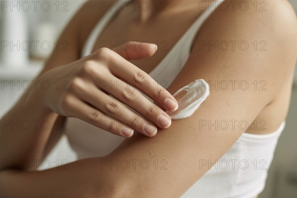 Close-up of woman applying moisturizing cream to arm. Concept for skincare and self-care routine. Generative ai, AI generated