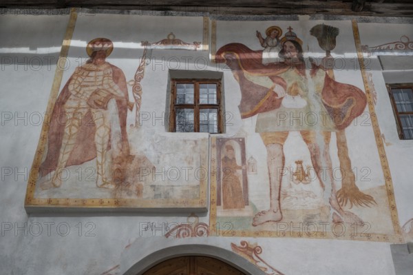 Religious frescoes on a historic farmhouse from 1602, BahnstraÃŸe, Telfes im Stubai, Austria the
