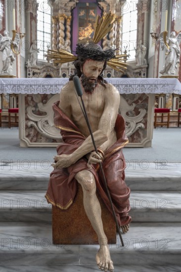 Large figure of Jesus in front of the altar of the collegiate basilica, Neustift St Margarethen, Vahrn, district of Bozen, South Tyrol, Italy