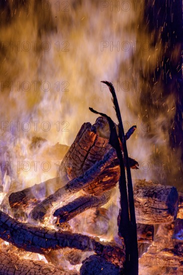 Tree trunks burning in a bonfire in the interior of the state of Minas Gerais during the traditional SÃ£o JoÃ£o festival, Minas Gerais, Brazil