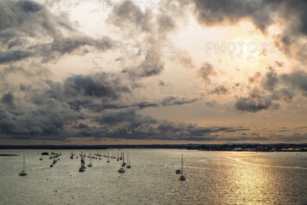 Sunset of Yachts over Ramshorn Lake and Brownsea, Poole, Dorset, England, United Kingdom