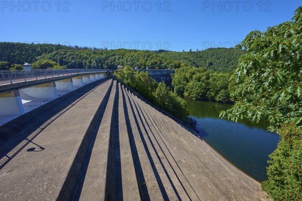 Oblique view of a dam with water reservoir surrounded by forest landscape, summer, Urft dam wall, Obersee, Urftsee, Schleiden, Eifel National Park, Eifel, North Rhine-Westphalia, Germany