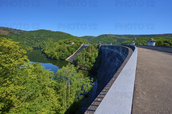 Large dam with water reservoir and lush forest under a clear sky, summer, Urft dam wall, Obersee, Urftsee, Schleiden, Eifel National Park, Eifel, North Rhine-Westphalia, Germany
