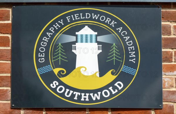 Geography Fieldwork Academy logo sign, Old Hospital community space building, Southwold, Suffolk, England, UK