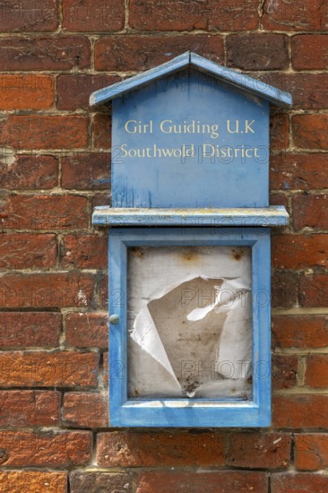 Girl Guides Guiding noticeboard derelict disused in ageing town short of children, Southwold, Suffolk, England, UK