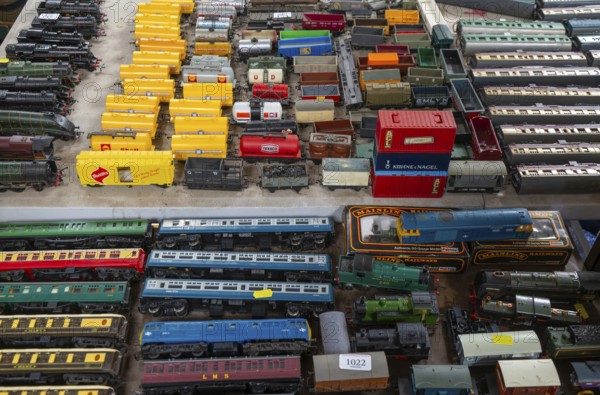Model railway toy train set items on display for sale at auction room, UK