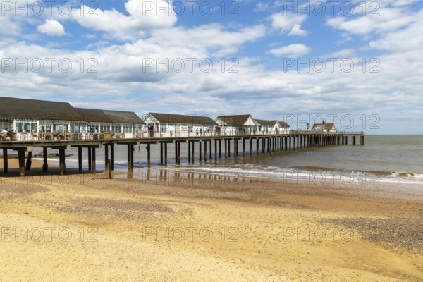 Sandy beach and pier, Southwold, Suffolk, England, UK
