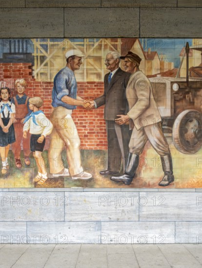 Close-up of the GDR-era Max Lingner propaganda mural, Detlev Rohwedder House, Berlin, Germany