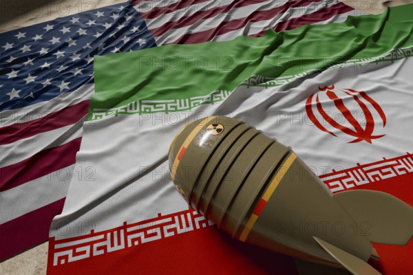 Nuclear bomb, american and Iranian flags resting on desert sand