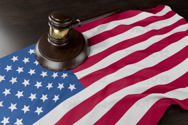 American flag and wooden gavel resting on desk