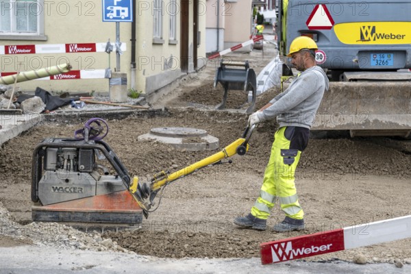 Construction site Road construction Construction worker Vibratory plate