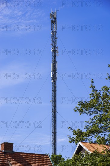 Telecommunications transmission mast in the city centre of Lysekil, BohuslÃ¤n, VÃ¤stra Götalands lÃ¤n, Sweden, Scandinavia