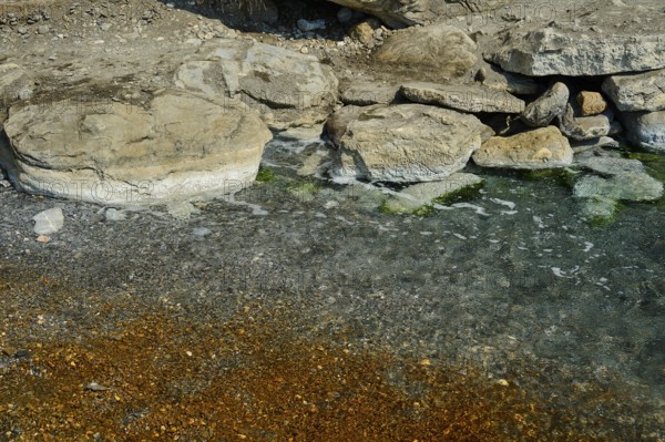 Rocky shore with clear and gently foaming waves, natural textures, Embros Thermal Baths, Kos, Dodecanese, Greek Islands, Greece