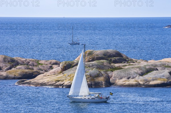 Archipelago with sailing boats off the coast of Lysekil, BohuslÃ¤n, VÃ¤stra Götalands lÃ¤n, Sweden, Scandinavia