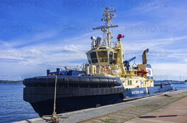 The tug SVITZER GAIA is moored in the harbour of Lysekil, BohuslÃ¤n, VÃ¤stra Götalands lÃ¤n, Sweden, Scandinavia
