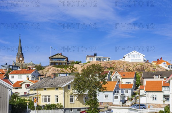 View from the quay in the south to the houses and church of Lysekil, BohuslÃ¤n, VÃ¤stra Götalands lÃ¤n, Sweden, Scandinavia