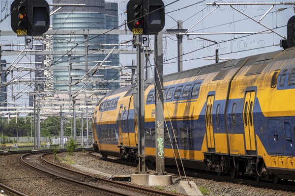 Rail transport in the Netherlands, Nederlandse Spoorwegen, Intercity train, double-decker IC VIRM, on the tracks in front of Utrecht Centraal station, Netherlands