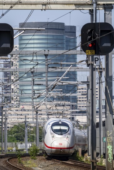 Rail traffic in the Netherlands, ICE 3neo of Deutsche Bundesbahn on the way to Amsterdam Centraal, on the tracks in front of Utrecht Centraal station, Netherlands